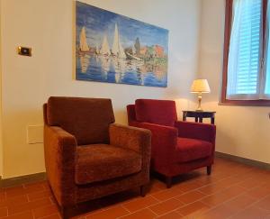 Posezení v ubytování ALLOGGIO GLI SCOIATTOLI