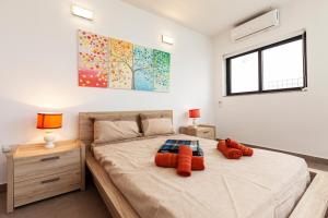 Postel nebo postele na pokoji v ubytování Perfect Seaview Penthouse