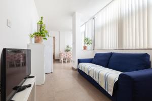 TV a/nebo společenská místnost v ubytování Perfect Seaview Penthouse