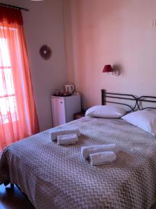 Postel nebo postele na pokoji v ubytování Guesthouse Corali