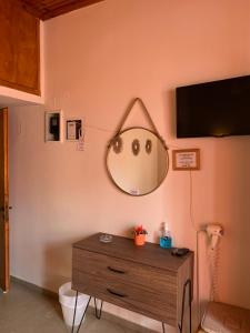 TV a/nebo společenská místnost v ubytování Guesthouse Corali