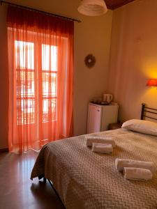 Postel nebo postele na pokoji v ubytování Guesthouse Corali