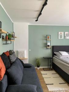 Postel nebo postele na pokoji v ubytování Újhely vára Apartman
