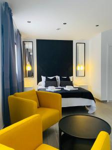 Postel nebo postele na pokoji v ubytování Hostal Alisol Boutique San Pedro