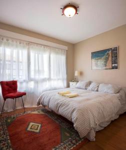 Postel nebo postele na pokoji v ubytování Bakio Beach I apartment by Aston Rentals + 17 fotografií