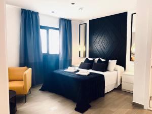 Postel nebo postele na pokoji v ubytování Hostal Alisol Boutique San Pedro