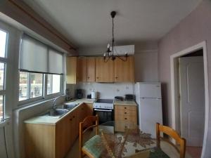Kuchyň nebo kuchyňský kout v ubytování Tripoli Center
