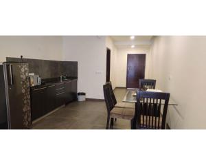 Кухня или мини-кухня в Aarju Luxurious Stay Calangute
