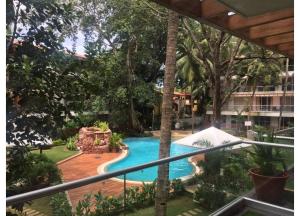 Бассейн в Aarju Luxurious Stay Calangute или поблизости