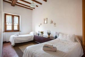 Posteľ alebo postele v izbe v ubytovaní Guest House il Gatto