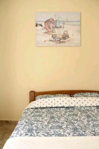 Postel nebo postele na pokoji v ubytování Aurora Apartments