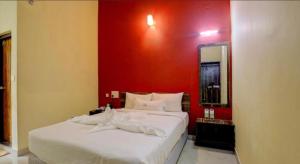 Postel nebo postele na pokoji v ubytování Lazo Areca Resort , Coorg