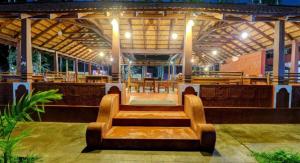 Restaurace v ubytování Lazo Areca Resort , Coorg