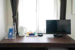 TV a/nebo společenská místnost v ubytování Hotel Casabella Inn Kobe