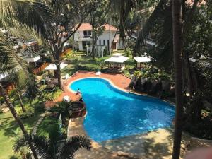 Бассейн в Aarju Luxurious Stay Calangute или поблизости