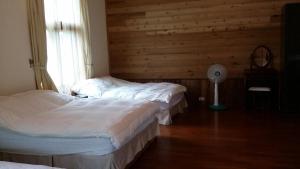 Postel nebo postele na pokoji v ubytování Summer Trail B&B