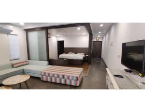 Телевизор и/или развлекательный центр в Aarju Luxurious Stay Calangute