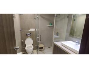 Ванная комната в Aarju Luxurious Stay Calangute