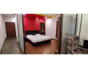 Кровать или кровати в номере Aarju Luxurious Stay Calangute