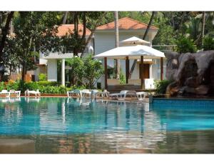 Бассейн в Aarju Luxurious Stay Calangute или поблизости
