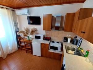 Kuchyň nebo kuchyňský kout v ubytování ML Saroko Apartment 2