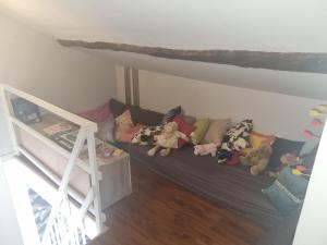 Łóżko lub łóżka w pokoju w obiekcie Maison la vague