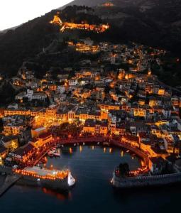 an aerial view of a city at night at NAFPAKTOS-luxury suite in Nafpaktos