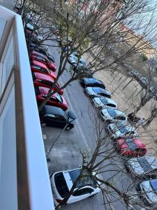 a bunch of cars parked in a parking lot at Ca la Noa in Viladecáns