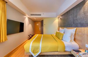 ibis Bengaluru Outer Ring Road客房内的一张或多张床位