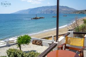 a view of the beach from a restaurant at Ferogia in Skiros