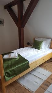 Postel nebo postele na pokoji v ubytování Visnyó Vendégház