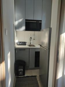 Kuchyňa alebo kuchynka v ubytovaní Love Lair Apartman