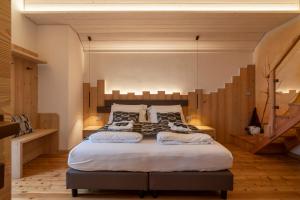 Posteľ alebo postele v izbe v ubytovaní Casera Moda Luxury Chalet