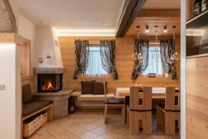 Posedenie v ubytovaní Casera Moda Luxury Chalet