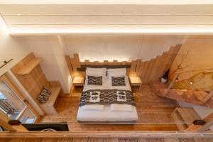 Posteľ alebo postele v izbe v ubytovaní Casera Moda Luxury Chalet
