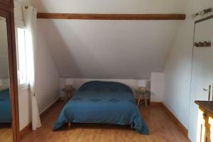 Posteľ alebo postele v izbe v ubytovaní Maison de montagne au calme avec cheminée