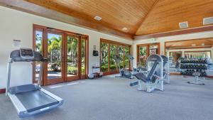 a gym with several exercise equipment in a room at 3Bd Kamilo 349 Home At Mauna Lani Resort in Waikoloa
