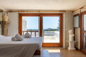 Postel nebo postele na pokoji v ubytování Villa Puig Blanc + 22 fotografií