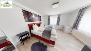 Postel nebo postele na pokoji v ubytování Apartementhaus Schöndorfer