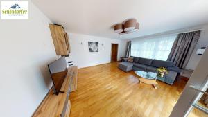 TV a/nebo společenská místnost v ubytování Apartementhaus Schöndorfer