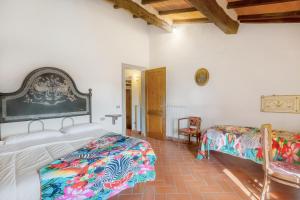 a bedroom with two beds in a room at Universal Harmony - Poiana in Dicomano +22 photos