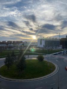 a view of a city with the sun setting at Pamplona ciudad maravilla in Pamplona