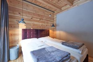 Кровать или кровати в номере Xeis Natur Apartments