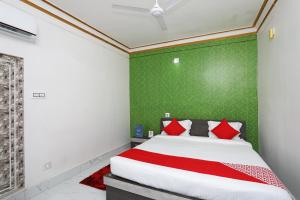 Lova arba lovos apgyvendinimo įstaigoje OYO Aradhya Residency