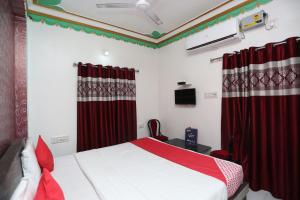 TV a/nebo společenská místnost v ubytování Hotel O Aradhya Residency