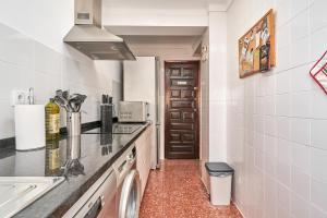 A kitchen or kitchenette at Apartment in Algarrobo Costa