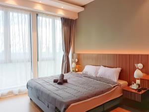 Postel nebo postele na pokoji v ubytování Medini LUXURY Suite, 3min to Legoland,3BR Netflix + 37 fotografií