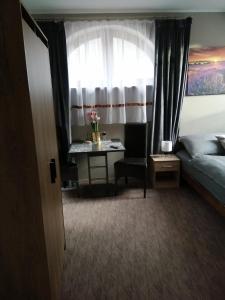 A bed or beds in a room at APARTMÁNY PIETRO