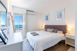 Postel nebo postele na pokoji v ubytování Benalmadena, apartment with wonderful views
