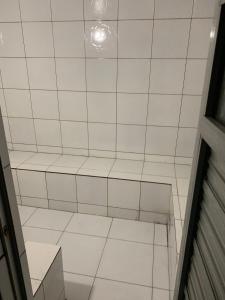 Ένα μπάνιο στο Gran Lençóis Flat Residence
